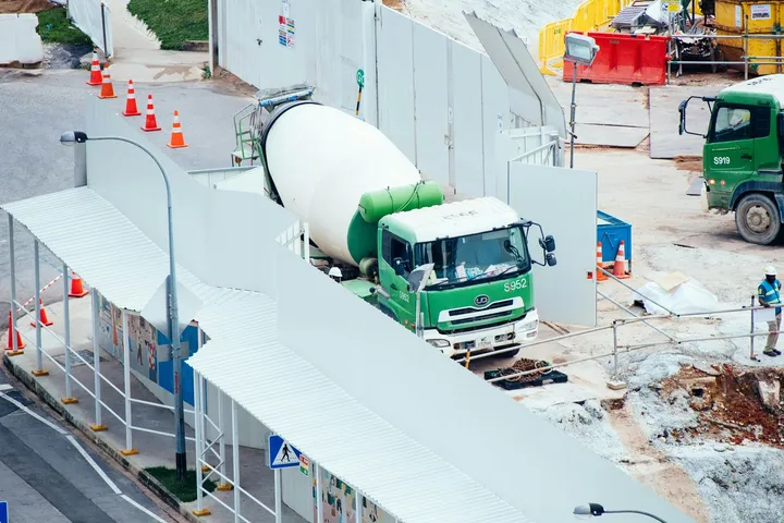 Concrete mixer truck at a building site