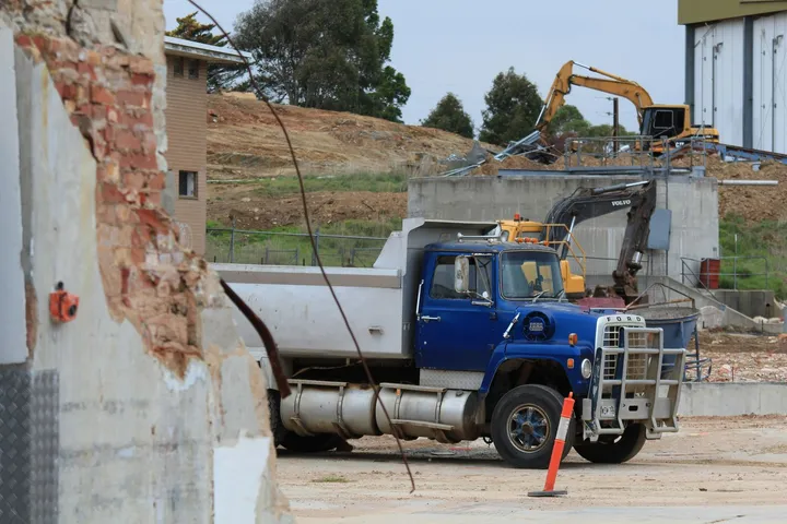 Blue tipper on a building site